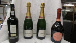 Three bottles of Laurent-Perrier champagne (2 white and 1 pink) and a bottle of 1994 vintage port,