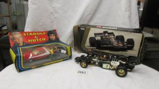 A Corgi 292 Starsky & Hutch Ford (missing 1 figure) and a Corgi 190 JPS Lotus Formula 1.