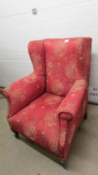 An Edwardian wing armchair, COLLECT ONLY.