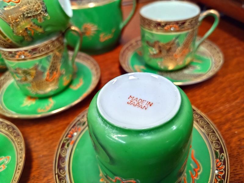 A Japanese gilded dragon on green background coffee set (missing 1 saucer) COLLECT ONLY - Image 2 of 2