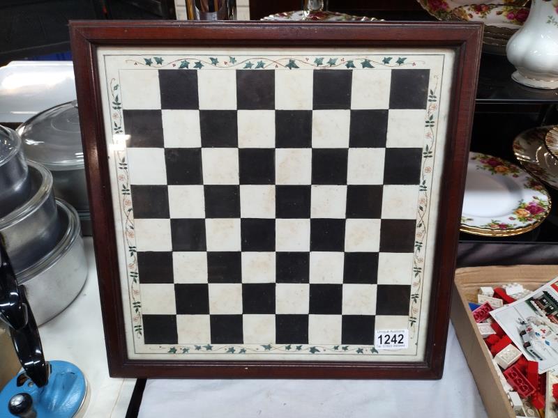 A glazed top chess board 39.5cm x 39.5cm COLLECT ONLY