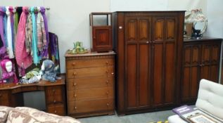 A 5 piece oak bedroom suite of dressing table, double wardrobe, gents wardrobe, bedside cabinet &