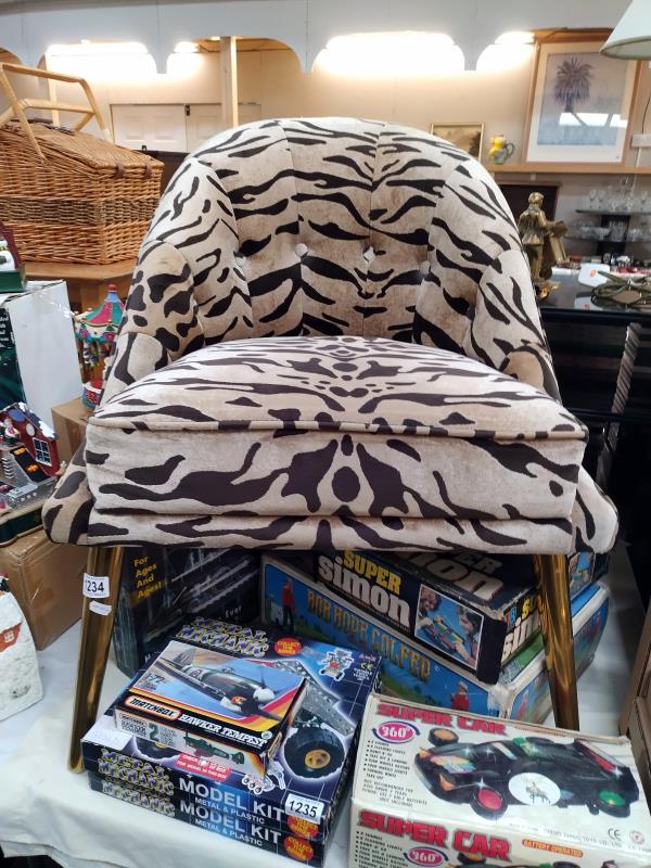 An animal print tub chair COLLECT ONLY