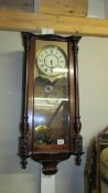 A Victorian mahogany Vienna wall clock. COLLECT ONLY.