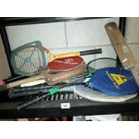 A quantity of vintage sports rackets etc