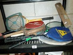 A quantity of vintage sports rackets etc