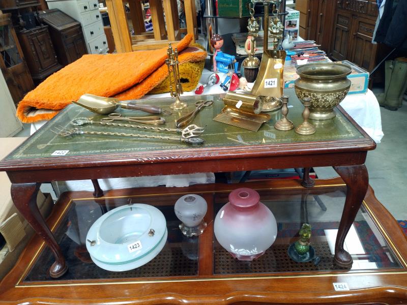 A dark wood stained coffee table with glazed leather top. 95cm 46cm x Height 43cm. COLLECT ONLY.