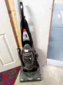 A Panasonic edge cleaning upright folding hoover