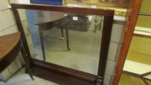 A mahogany over mantel mirror. COLLECT ONLY.