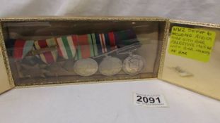 A WW2 set of six including Africa star with bar, Palestine 1945-48 with bar all mounted on a bar.