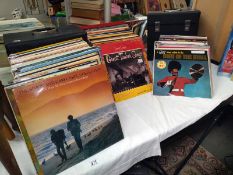 A collection of LP's including Simon and Garfunkel