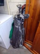 An old golf bag and set of clubs including John Letters master model