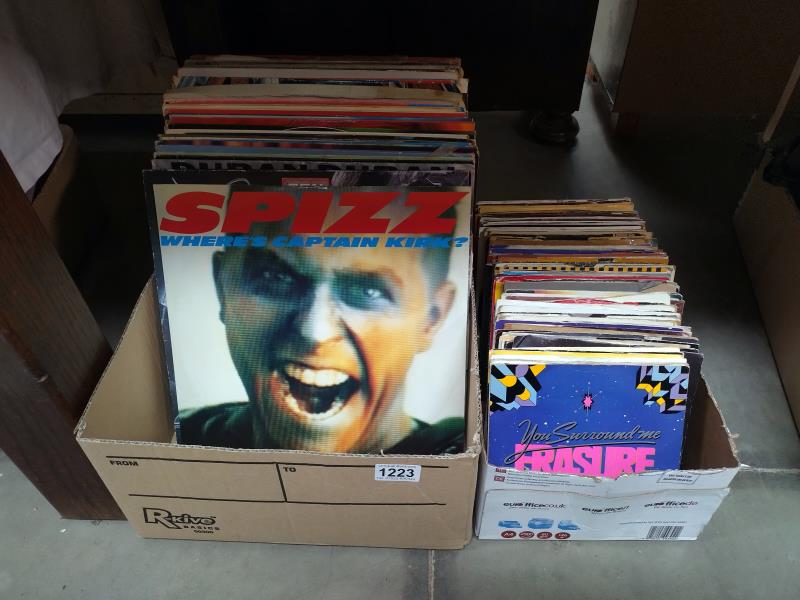 2 boxes of vinyl records including 33's and 45's, various artists