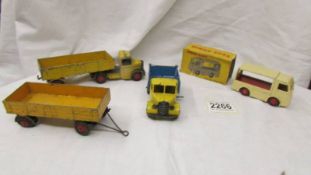A qty of unboxed Dinky Bedford Lorries inc. Express dairy milk float & a 551 trailer in rare yellow