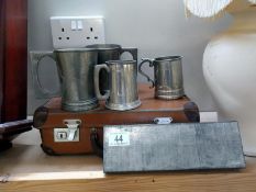 A quantity of tankards & small vintage suitcase etc.