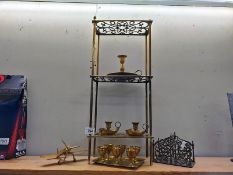 A selection of brassware including letter rack, candlesticks , aeroplane etc