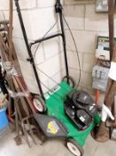 A Braggs and Stratton classic petrol mower