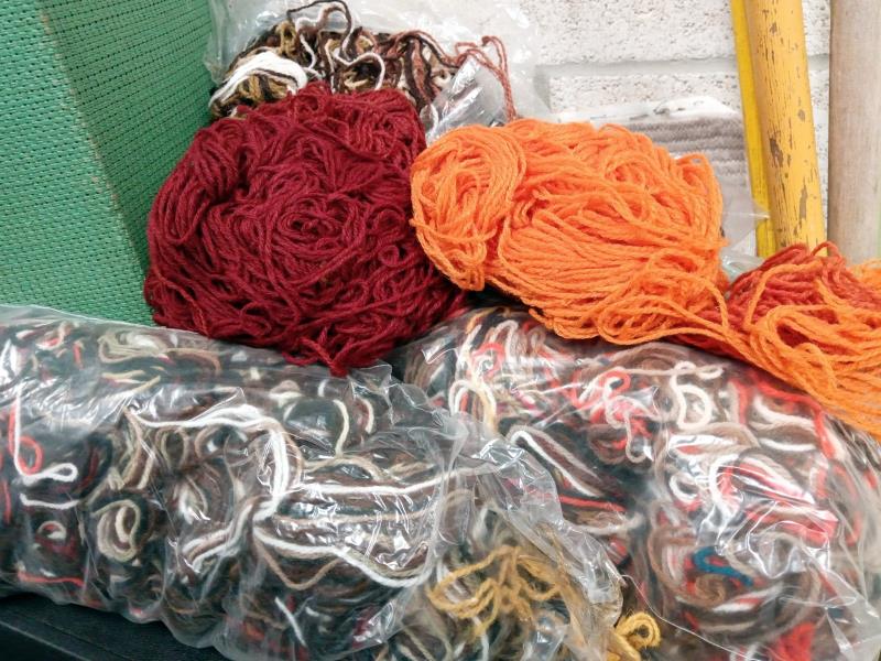 A Lloyd loom style laundry basket with a large lot of wool/embroidery - Image 3 of 3