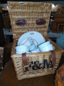 A F&M picnic basket with a Colclough tea set.