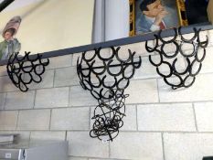 3 metal welded horseshoe hanging baskets and plant stands