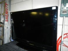 A 32" Toshiba television on a black stand. COLLECT ONLY.
