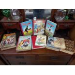 A selection of vintage children's books & annuals (worn covers on some)