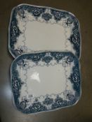 Two blue and white meat platters,.