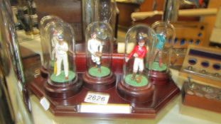 Six 'Our Glorious Sporting Heritage' figures under glass domes and on stand, COLLECT ONLY.