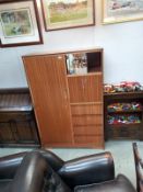 A retro teak bedroom unit. 103 cm x 47cm x height 153cm COLLECT ONLY