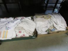 Two boxes of assorted linen.