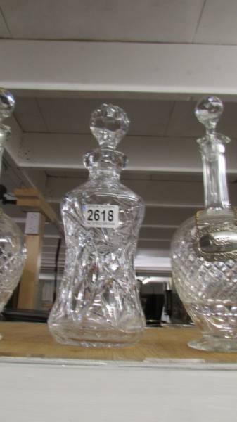 A pair of cut glass decanters with labels and another cut glass decanter. - Image 3 of 3