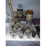 A quantity of stoneware bottles and jars