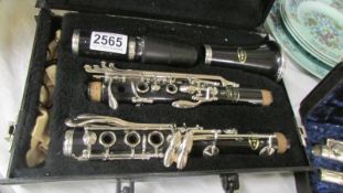 A cased Vito Reso-tone 3 clarinet.