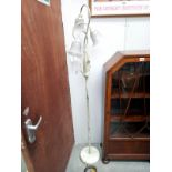 A shabby chic floor standing metal standard lamp with 3 shades COLLECT ONLY.