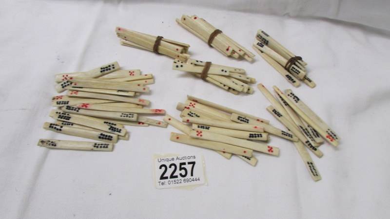 A quantity of old bone counters.