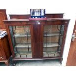 An Edwardian mahogany display cabinet with astragal glazed doors 138cm x 41cm x 135cm high COLLECT