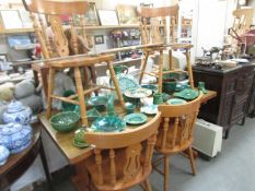 A pine dining table and four chairs. COLLECT ONLY.