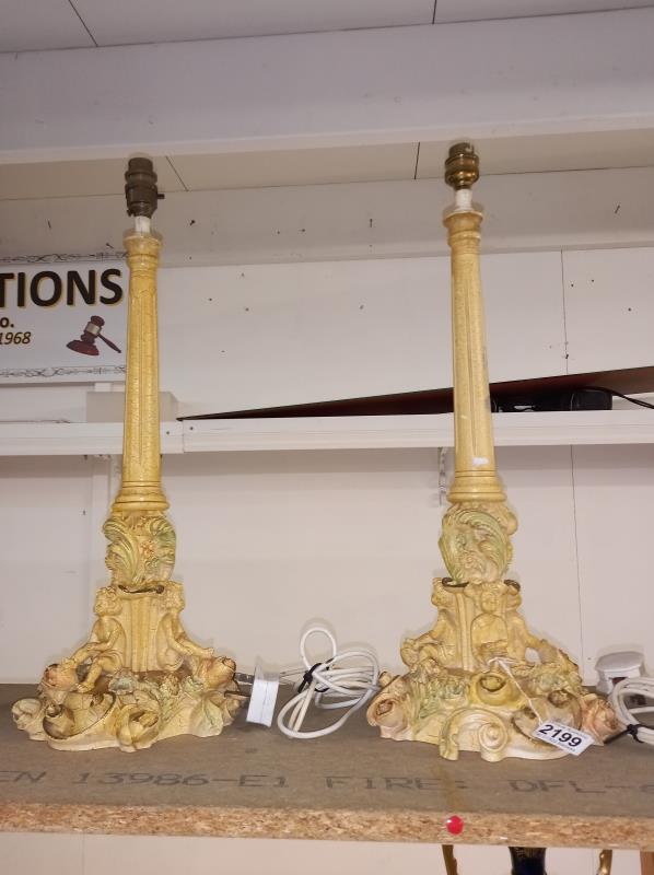 A pair of decorative table lamp bases (no shades).
