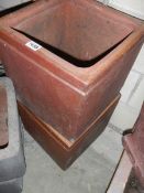 Two square fired earth planters 36 cm square x 34 cm deep and 31 cm square x 232 cm deep,