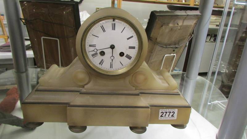 A 19th-century 8 day alabaster mantel clock in working order, COLLECT ONLY.