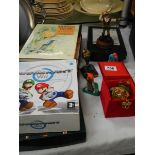 A mixed lot including golf figures, books including Lord of the rings, jigsaw, game etc.,