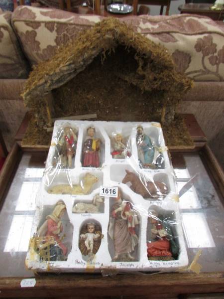 A boxed Nativity set.