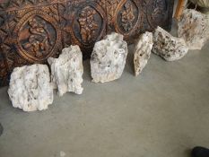 Six pieces of honeycombe limestone rock.