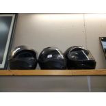 3 motorcycle helmets