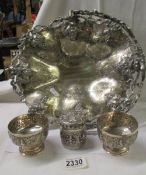 Three items of Indian silver and a decorative silver plate basket.