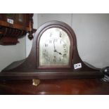 A mantel clock with silvered dial in working order. COLLECT ONLY.