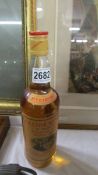 A bottle of Glenmorangie 10 yr old Highland Malt Scotch Whisky.