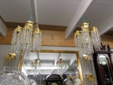 Two 24ct gold plated Swaroski crystal chandeliers and four matching wall lights. COLLECT ONLY.