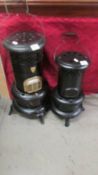 Two vintage paraffin heaters (small one missing its burner) COLLECT ONLY.