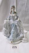 A Royal Doulton Compton & Woodhouse limited edition Cinderalla figurine with blue colouring.